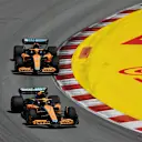 BARCELONA, SPAIN - MAY 22: Lando Norris of Great Britain driving the (4) McLaren MCL36 Mercedes leads Daniel Ricciardo of Australia driving the (3) McLaren MCL36 Mercedes during the F1 Grand Prix of Spain at Circuit de Barcelona-Catalunya on May 22, 2022 in Barcelona, Spain. (Photo by Bryn Lennon - Formula 1/Formula 1 via Getty Images)