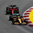 BARCELONA, SPAIN - MAY 22: Lando Norris of Great Britain driving the (4) McLaren MCL36 Mercedes leads Carlos Sainz of Spain driving (55) the Ferrari F1-75 during the F1 Grand Prix of Spain at Circuit de Barcelona-Catalunya on May 22, 2022 in Barcelona, Spain. (Photo by Lars Baron/Getty Images)