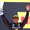 BARCELONA, SPAIN - MAY 22: Second placed Sergio Perez of Mexico and Oracle Red Bull Racing celebrates on the podium during the F1 Grand Prix of Spain at Circuit de Barcelona-Catalunya on May 22, 2022 in Barcelona, Spain. (Photo by Alex Pantling - Formula 1/Formula 1 via Getty Images)