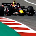 AUSTIN, TEXAS - OCTOBER 21: Sergio Perez of Mexico driving the (11) Oracle Red Bull Racing RB18 on track during practice ahead of the F1 Grand Prix of USA at Circuit of The Americas on October 21, 2022 in Austin, Texas. (Photo by Chris Graythen/Getty Images)