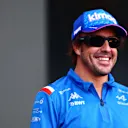AUSTIN, TEXAS - OCTOBER 22: Fernando Alonso of Spain and Alpine F1 greets the crowd on the fan stage prior to final practice ahead of the F1 Grand Prix of USA at Circuit of The Americas on October 22, 2022 in Austin, Texas. (Photo by Dan Istitene - Formula 1/Formula 1 via Getty Images)