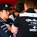 AUSTIN, TEXAS - OCTOBER 22: Zhou Guanyu of China and Alfa Romeo F1 in the garage prior to final practice ahead of the F1 Grand Prix of USA at Circuit of The Americas on October 22, 2022 in Austin, Texas. (Photo by Dan Istitene - Formula 1/Formula 1 via Getty Images)