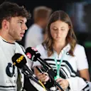 AUSTIN, TEXAS - OCTOBER 22: Thirteenth placed qualifier Pierre Gasly of France and Scuderia AlphaTauri talks to the media in the Paddock during qualifying ahead of the F1 Grand Prix of USA at Circuit of The Americas on October 22, 2022 in Austin, Texas. (Photo by Peter Fox/Getty Images)