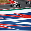 AUSTIN, TEXAS - OCTOBER 23: Pierre Gasly of France driving the (10) Scuderia AlphaTauri AT03 leads Yuki Tsunoda of Japan driving the (22) Scuderia AlphaTauri AT03 during the F1 Grand Prix of USA at Circuit of The Americas on October 23, 2022 in Austin, Texas. (Photo by Chris Graythen/Getty Images)