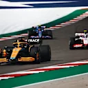 AUSTIN, TEXAS - OCTOBER 23: Daniel Ricciardo of Australia driving the (3) McLaren MCL36 Mercedes leads Mick Schumacher of Germany driving the (47) Haas F1 VF-22 Ferrari and Esteban Ocon of France driving the (31) Alpine F1 A522 Renault on track during the F1 Grand Prix of USA at Circuit of The Americas on October 23, 2022 in Austin, Texas. (Photo by Chris Graythen/Getty Images)