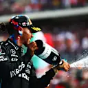 AUSTIN, TEXAS - OCTOBER 23: Second placed Lewis Hamilton of Great Britain and Mercedes celebrates on the podium following the F1 Grand Prix of USA at Circuit of The Americas on October 23, 2022 in Austin, Texas. (Photo by Dan Istitene - Formula 1/Formula 1 via Getty Images)