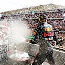 AUSTIN, TEXAS - OCTOBER 23: Race winner Max Verstappen of the Netherlands and Oracle Red Bull Racing celebrates on the podium following the F1 Grand Prix of USA at Circuit of The Americas on October 23, 2022 in Austin, Texas. (Photo by Dan Istitene - Formula 1/Formula 1 via Getty Images)