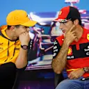 AUSTIN, TEXAS - OCTOBER 20: Lando Norris of Great Britain and McLaren and Carlos Sainz of Spain and Ferrari talk in the Drivers Press Conference during previews ahead of the F1 Grand Prix of USA at Circuit of The Americas on October 20, 2022 in Austin, Texas. (Photo by Jared C. Tilton/Getty Images)