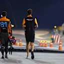 BAHRAIN, BAHRAIN - MARCH 04: 18th placed qualifier Oscar Piastri of Australia and McLaren walks in the Pitlane during qualifying ahead of the F1 Grand Prix of Bahrain at Bahrain International Circuit on March 04, 2023 in Bahrain, Bahrain. (Photo by Mark Thompson/Getty Images)