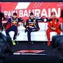 BAHRAIN, BAHRAIN - MARCH 04: Pole position qualifier Max Verstappen of the Netherlands and Oracle Red Bull Racing (C), Second placed qualifier Sergio Perez of Mexico and Oracle Red Bull Racing (L) and Third placed qualifier Charles Leclerc of Monaco and Ferrari (R) attend the press conference after qualifying ahead of the F1 Grand Prix of Bahrain at Bahrain International Circuit on March 04, 2023 in Bahrain, Bahrain. (Photo by Dan Istitene/Getty Images)
