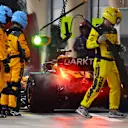 BAHRAIN, BAHRAIN - MARCH 05: Lando Norris of Great Britain driving the (4) McLaren MCL60 Mercedes makes a pitstop during the F1 Grand Prix of Bahrain at Bahrain International Circuit on March 05, 2023 in Bahrain, Bahrain. (Photo by Mark Thompson/Getty Images)