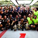 BAHRAIN, BAHRAIN - MARCH 05: The Red Bull Racing team celebrate in the garage after securing a 1-2 finish during the F1 Grand Prix of Bahrain at Bahrain International Circuit on March 05, 2023 in Bahrain, Bahrain. (Photo by Mark Thompson/Getty Images)