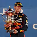 BAHRAIN, BAHRAIN - MARCH 05: Race winner Max Verstappen of the Netherlands and Oracle Red Bull Racing celebrates on the podium during the F1 Grand Prix of Bahrain at Bahrain International Circuit on March 05, 2023 in Bahrain, Bahrain. (Photo by Lars Baron/Getty Images)