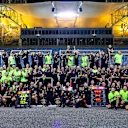 BAHRAIN, BAHRAIN - MARCH 05: Race winner Max Verstappen of the Netherlands and Oracle Red Bull Racing and Second placed Sergio Perez of Mexico and Oracle Red Bull Racing celebrate with their team after the F1 Grand Prix of Bahrain at Bahrain International Circuit on March 05, 2023 in Bahrain, Bahrain. (Photo by Mark Thompson/Getty Images)