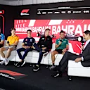 BAHRAIN, BAHRAIN - MARCH 02: (L-R) Logan Sargeant of United States and Williams, Oscar Piastri of Australia and McLaren, Nyck de Vries of Netherlands and Scuderia AlphaTauri, Nico Hulkenberg of Germany and Haas F1 and Fernando Alonso of Spain and Aston Martin F1 Team attend the Drivers Press Conference during previews ahead of the F1 Grand Prix of Bahrain at Bahrain International Circuit on March 02, 2023 in Bahrain, Bahrain. (Photo by Lars Baron/Getty Images)