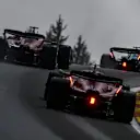 Ferrari's Monegasque driver Charles Leclerc (L), Ferrari's Spanish driver Carlos Sainz Jr (down) and Mercedes' British driver Lewis Hamilton (R) compete during the sprint shootout ahead of the Formula One Belgian Grand Prix at the Spa-Francorchamps Circuit in Spa on July 29, 2023. (Photo by JOHN THYS / AFP) (Photo by JOHN THYS/AFP via Getty Images)