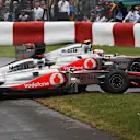 Hamilton picked up terminal car damage in his clash with team mate Button