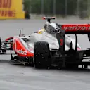 Hamilton picked up terminal car damage in his clash with team mate Button