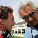 Horner, seen here speaking to Flavio Briatore, built up vital experience in the junior categories with Arden
