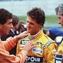 Chatting to a young Michael Schumacher here, Senna enjoyed a bold colour choice, such as his orange jumper