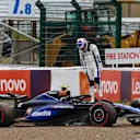 SUZUKA, JAPAN - APRIL 05: Logan Sargeant of United States and Williams climbs from his car after crashing during practice ahead of the F1 Grand Prix of Japan at Suzuka International Racing Course on April 05, 2024 in Suzuka, Japan. (Photo by Kym Illman/Getty Images)