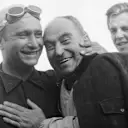 Fagioli, the oldest race winner in F1 history, seen here (centre) sharing a smile with Fangio