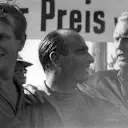 Fangio with Collins (left) and Hawthorn (right) after their thrilling Nurburgring battle