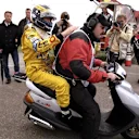 Frentzen was in the mix for victory again at the Nurburgring, only to end his day on the back of a scooter