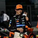 TOPSHOT - McLaren's Australian driver Oscar Piastri gives a thumbs as he celebrates taking pole position in the qualifying session of the Formula One Chinese Grand Prix at the Shanghai International Circuit in Shanghai on March 22, 2025. (Photo by GREG BAKER / AFP) (Photo by GREG BAKER/AFP via Getty Images)