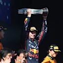 IMOLA, ITALY - MAY 18: Race winner Max Verstappen of the Netherlands and Oracle Red Bull Racing lifts the winners trophy on the podium during the F1 Grand Prix of Emilia-Romagna at Autodromo Internazionale Enzo e Dino Ferrari on May 18, 2025 in Imola, Italy. (Photo by Peter Fox/LAT Images)