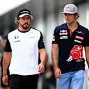 NORTHAMPTON, ENGLAND - JULY 03:  Carlos Sainz of Spain and Scuderia Toro Rosso speaks with Fernando