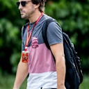 SINGAPORE - SEPTEMBER 14:  Fernando Alonso of Spain and McLaren Honda walks in the Paddock during
