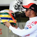 Lewis Hamilton pays tribute to his idol Senna with a special helmet for the Sao Paulo Grand Prix in 2011. Swipe to see more images