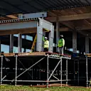 The construction process for the Miami International Autodrome campus sees crews work around the clock to ensure the venue is ready for the F1 weekend