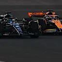 ABU DHABI, UNITED ARAB EMIRATES - NOVEMBER 26: George Russell of Great Britain driving the (63) Mercedes AMG Petronas F1 Team W14 leads Oscar Piastri of Australia driving the (81) McLaren MCL60 Mercedes during the F1 Grand Prix of Abu Dhabi at Yas Marina Circuit on November 26, 2023 in Abu Dhabi, United Arab Emirates. (Photo by Joe Portlock - Formula 1/Formula 1 via Getty Images)