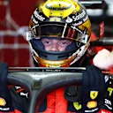 ABU DHABI, UNITED ARAB EMIRATES - NOVEMBER 24: Robert Shwartzman of Israel and Ferrari prepares to drive in the garage during practice ahead of the F1 Grand Prix of Abu Dhabi at Yas Marina Circuit on November 24, 2023 in Abu Dhabi, United Arab Emirates. (Photo by Clive Rose/Getty Images)