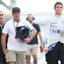 ABU DHABI, UNITED ARAB EMIRATES - NOVEMBER 24: Jack Doohan of Australia and Alpine F1 and Mick Doohan walk in the Pitlane during practice ahead of the F1 Grand Prix of Abu Dhabi at Yas Marina Circuit on November 24, 2023 in Abu Dhabi, United Arab Emirates. (Photo by Clive Rose/Getty Images)