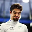 ABU DHABI, UNITED ARAB EMIRATES - NOVEMBER 25: 13th placed qualifier Lance Stroll of Canada and Aston Martin F1 Team looks on in the FIA garage during qualifying ahead of the F1 Grand Prix of Abu Dhabi at Yas Marina Circuit on November 25, 2023 in Abu Dhabi, United Arab Emirates. (Photo by Dan Istitene - Formula 1/Formula 1 via Getty Images)