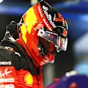 ABU DHABI, UNITED ARAB EMIRATES - NOVEMBER 25: 16th placed qualifier Carlos Sainz of Spain and Ferrari looks on in the FIA garage during qualifying ahead of the F1 Grand Prix of Abu Dhabi at Yas Marina Circuit on November 25, 2023 in Abu Dhabi, United Arab Emirates. (Photo by Dan Istitene - Formula 1/Formula 1 via Getty Images)