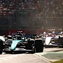MELBOURNE, AUSTRALIA - APRIL 02: Lance Stroll of Canada driving the (18) Aston Martin AMR23 Mercedes leads Pierre Gasly of France driving the (10) Alpine F1 A523 Renault during the F1 Grand Prix of Australia at Albert Park Grand Prix Circuit on April 02, 2023 in Melbourne, Australia. (Photo by Robert Cianflone/Getty Images)