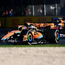 MELBOURNE, AUSTRALIA - APRIL 02: Oscar Piastri of Australia driving the (81) McLaren MCL60 Mercedes leads Sergio Perez of Mexico driving the (11) Oracle Red Bull Racing RB19 during the F1 Grand Prix of Australia at Albert Park Grand Prix Circuit on April 02, 2023 in Melbourne, Australia. (Photo by Quinn Rooney/Getty Images)