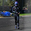 MELBOURNE, AUSTRALIA - APRIL 02: Alexander Albon of Thailand and Williams walks from his car after a crash that led to a red flag during the F1 Grand Prix of Australia at Albert Park Grand Prix Circuit on April 02, 2023 in Melbourne, Australia. (Photo by Clive Mason - Formula 1/Formula 1 via Getty Images)
