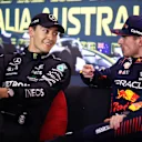 MELBOURNE, AUSTRALIA - APRIL 01: Pole position qualifier Max Verstappen of the Netherlands and Oracle Red Bull Racing (R) and Second placed qualifier George Russell of Great Britain and Mercedes (L) attend the press conference after qualifying ahead of the F1 Grand Prix of Australia at Albert Park Grand Prix Circuit on April 01, 2023 in Melbourne, Australia. (Photo by Robert Cianflone/Getty Images)