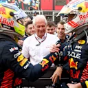 BAKU, AZERBAIJAN - APRIL 30: Race winner Sergio Perez of Mexico and Oracle Red Bull Racing and Second placed Max Verstappen of the Netherlands and Oracle Red Bull Racing celebrate  with Red Bull Racing Team Consultant Dr Helmut Marko in parc ferme during the F1 Grand Prix of Azerbaijan at Baku City Circuit on April 30, 2023 in Baku, Azerbaijan. (Photo by Bryn Lennon - Formula 1/Formula 1 via Getty Images)