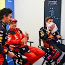 BAKU, AZERBAIJAN - APRIL 30: Race winner Sergio Perez of Mexico and Oracle Red Bull Racing (C) Third placed Charles Leclerc of Monaco and Ferrari (L) and Second placed Max Verstappen of the Netherlands and Oracle Red Bull Racing (R) talk ahead of the podium celebrations during the F1 Grand Prix of Azerbaijan at Baku City Circuit on April 30, 2023 in Baku, Azerbaijan. (Photo by Dan Mullan - Formula 1/Formula 1 via Getty Images)