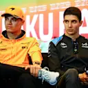 BAKU, AZERBAIJAN - APRIL 27: Lando Norris of Great Britain and McLaren and Esteban Ocon of France and Alpine F1 talk in a press conference during previews ahead of the F1 Grand Prix of Azerbaijan at Baku City Circuit on April 27, 2023 in Baku, Azerbaijan. (Photo by Bryn Lennon/Getty Images)