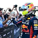 BAKU, AZERBAIJAN - APRIL 29: Sprint winner Sergio Perez of Mexico and Oracle Red Bull Racing celebrates with teammates in parc ferme during the Sprint ahead of the F1 Grand Prix of Azerbaijan at Baku City Circuit on April 29, 2023 in Baku, Azerbaijan. (Photo by Dan Mullan - Formula 1/Formula 1 via Getty Images)