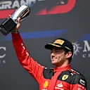 SPA, BELGIUM - JULY 30: Third placed Charles Leclerc of Monaco and Ferrari celebrates on the podium during the F1 Grand Prix of Belgium at Circuit de Spa-Francorchamps on July 30, 2023 in Spa, Belgium. (Photo by Dan Mullan/Getty Images)