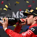 SPA, BELGIUM - JULY 30: Third placed Charles Leclerc of Monaco and Ferrari celebrates on the podium during the F1 Grand Prix of Belgium at Circuit de Spa-Francorchamps on July 30, 2023 in Spa, Belgium. (Photo by Dan Mullan/Getty Images)