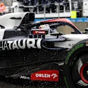 SPA, BELGIUM - JULY 28: Daniel Ricciardo of Australia driving the (3) Scuderia AlphaTauri AT04 in the Pitlane during practice ahead of the F1 Grand Prix of Belgium at Circuit de Spa-Francorchamps on July 28, 2023 in Spa, Belgium. (Photo by Peter Fox/Getty Images)